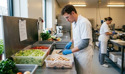 Sandwich production worker